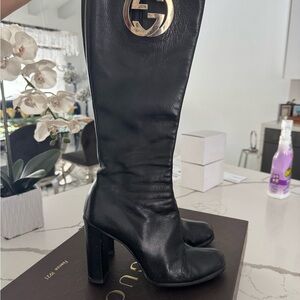 Gucci Black Leather Heeled Boots with Gold Accent